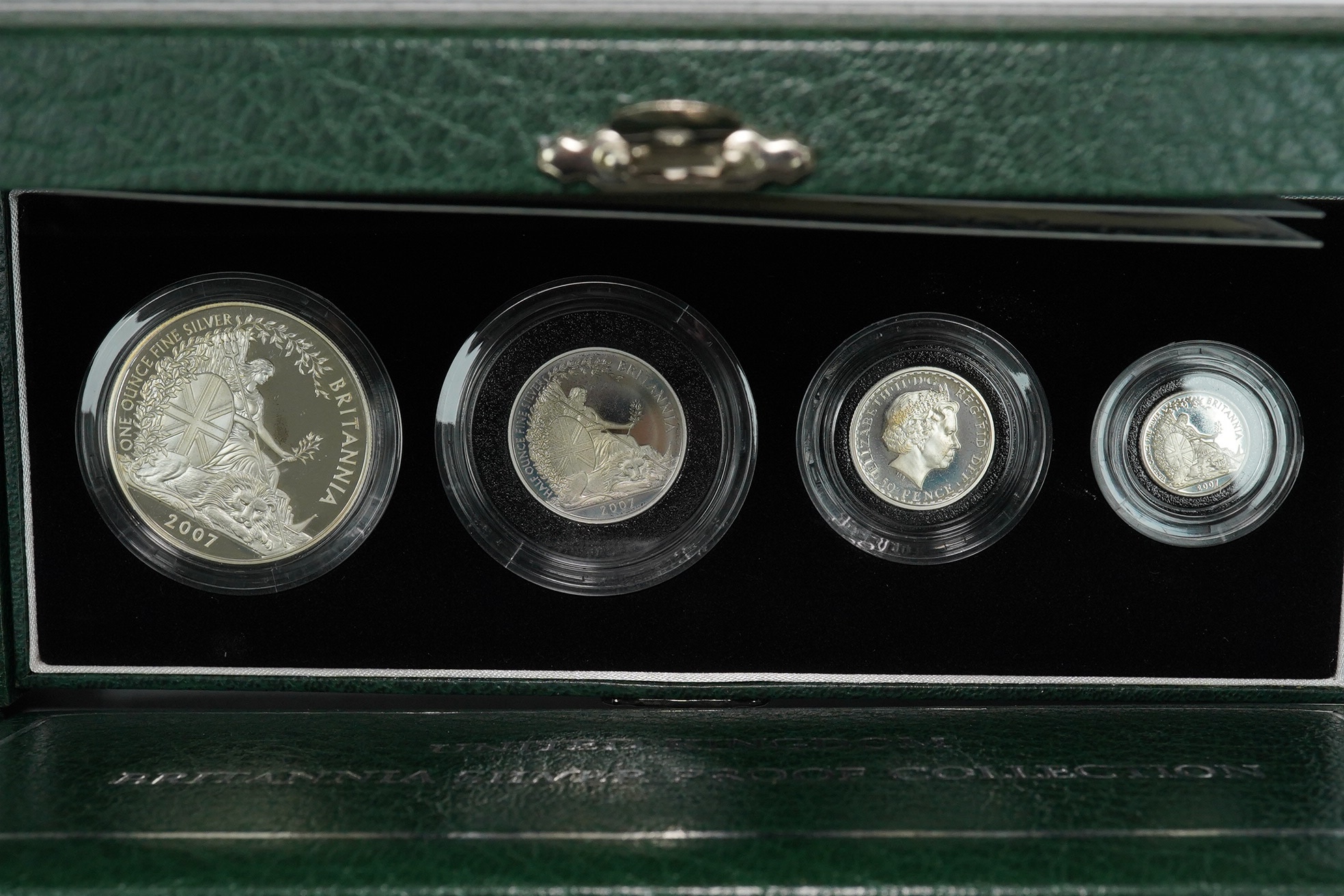 Royal Mint UK QEII coins, four Britannia collection silver proof four-coin sets, 1997, 2001, 2005 and 2007, in case of issue with certificate (4)